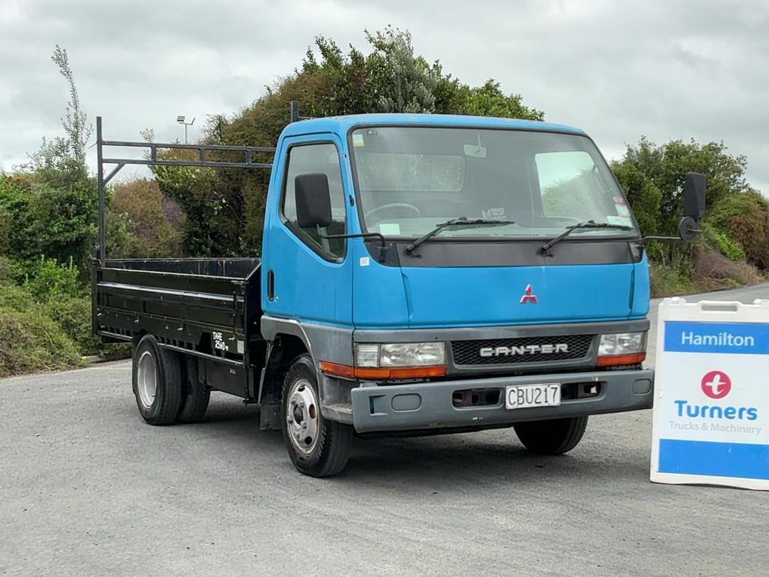 Photo '1' of Mitsubishi Canter FE112C4 Flat Deck
