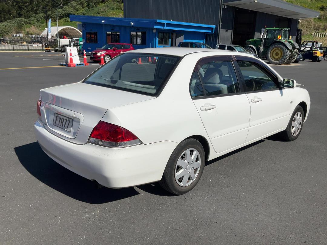 Photo '4' of Mitsubishi Lancer Photo '4' of Mitsubishi Lancer