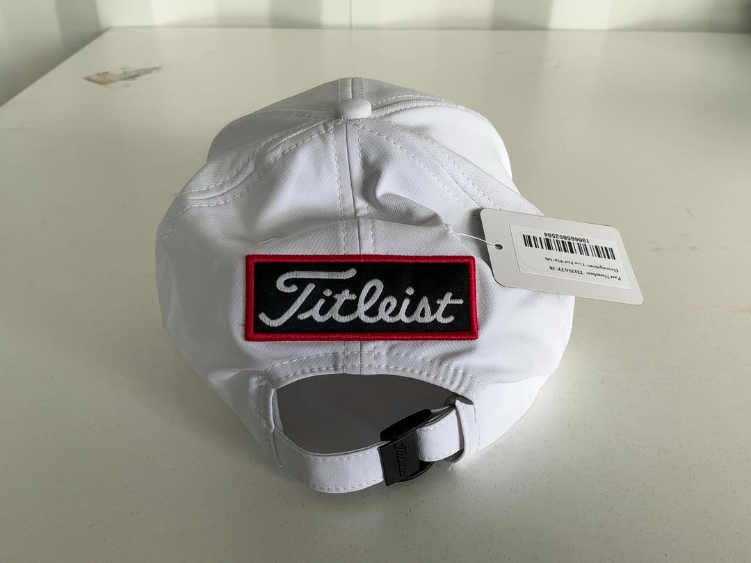 Photo '2' of Titleist Tour Perf Wht/blk Photo '2' of Titleist Tour Perf Wht/blk