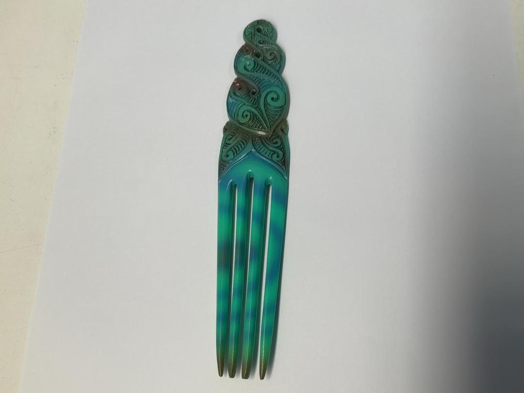Photo '4' of Bone Heru / Maori Hair Comb - Blue Paua Coloured Photo '4' of Bone Heru / Maori Hair Comb - Blue Paua Coloured