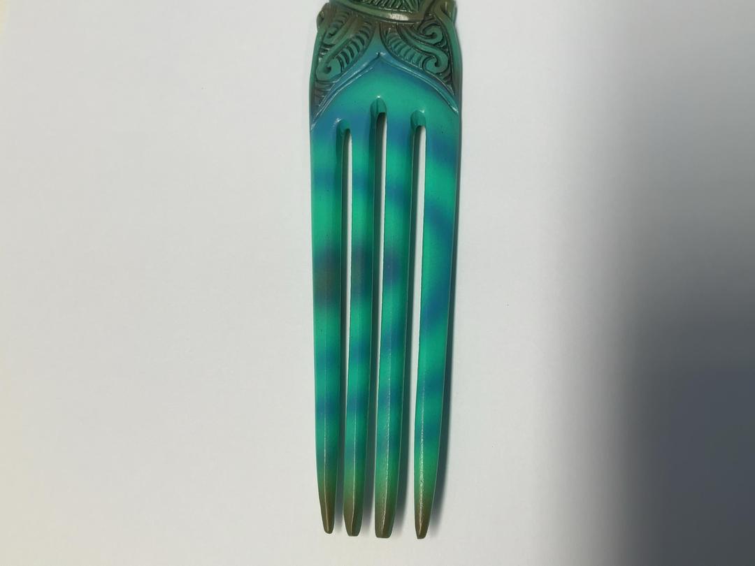Photo '6' of Bone Heru / Maori Hair Comb - Blue Paua Coloured Photo '6' of Bone Heru / Maori Hair Comb - Blue Paua Coloured