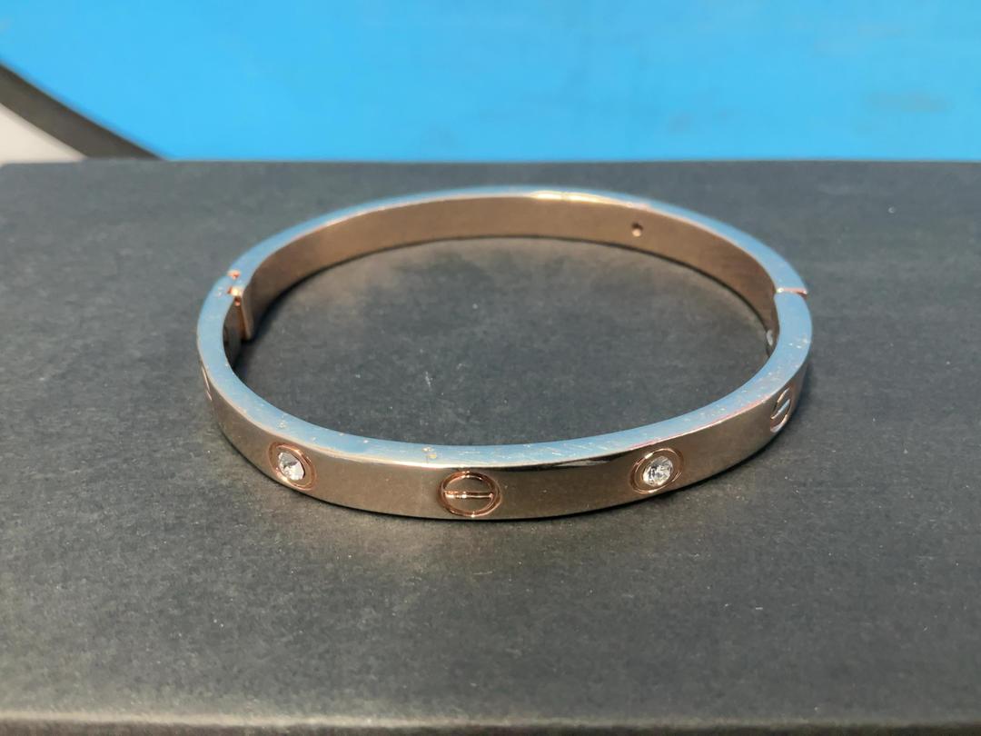 Photo '2' of Gold/Rose Gold Coloured Bangle with White Coloured Stones