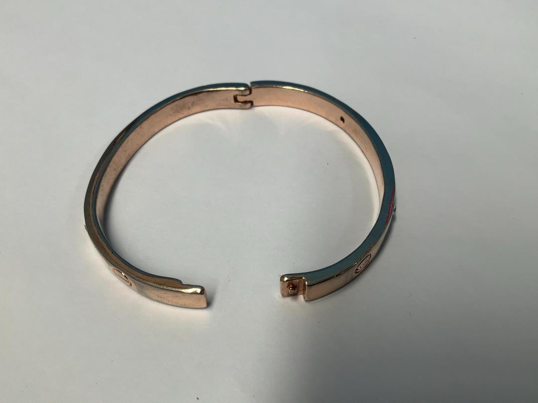 Photo '9' of Gold/Rose Gold Coloured Bangle with White Coloured Stones