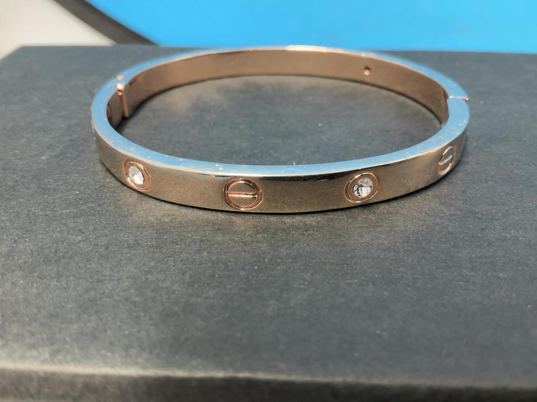Photo '12' of Gold/Rose Gold Coloured Bangle with White Coloured Stones
