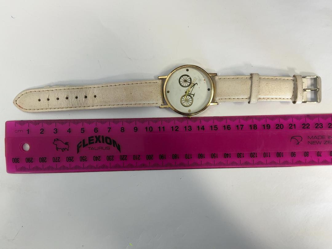 Photo '4' of Gold coloured watch face with cream coloured straps Photo '4' of Gold coloured watch face with cream coloured straps